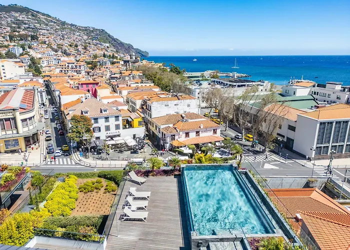 Terrace, Grill & Infinity Pool At Savoy Insular